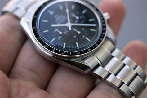 omega speedmaster reduced real vs fake